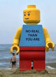 A giant, smiling Lego man was