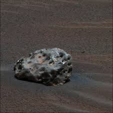 الشهب والنيازك والمذنبات PIA07269-Mars_Rover_Opportunity-Iron_Meteorite