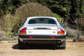 Image result for Glacier White 1988 Jaguar