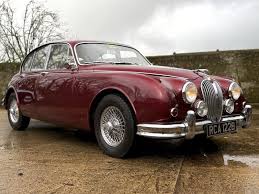 Image result for Grenadier Red 1987 Jaguar