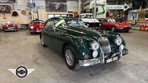 Image result for Dark Green 1959 Jaguar