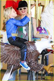 Image result for Queen B by Bumbleride $428 Gwen Stefani and Gavin Rossdale with Kingston and Zuma at the LA zoo