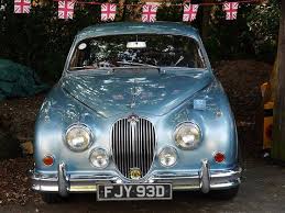 Image result for Silver Blue 1959 Jaguar