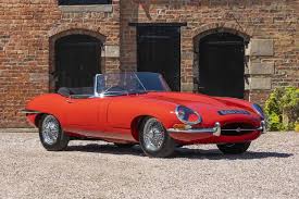 Image result for Maroon 1962 Jaguar