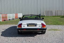 Image result for Glacier White 1988 Jaguar