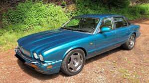 Image result for Bright Turquoise 1995 Jaguar