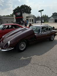 Image result for Maroon 1962 Jaguar