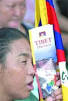 A Tibetan woman protests