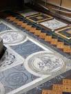 The floor tiles depict the seven deadly sins in the outer ring and the seven - via Daymix
