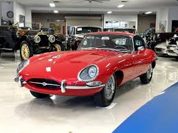Image result for Carmen Red 1961 Jaguar