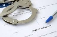 Will an active arrest warrant show on a criminal background check ...