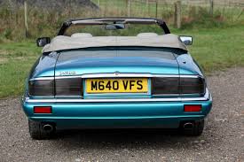 Image result for Bright Turquoise 1995 Jaguar