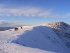 Helvellyn Lower Man. Brown Cove falls away to the right. People who are - via Daymix