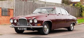 Image result for Carnelian Red 1979 Jaguar