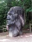 Red Indian face sculptured - via Daymix