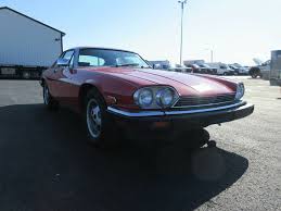 Image result for Sebring Red 1986 Jaguar