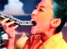 directed by Isao Nishigori for MTV Japan. © 1996 Music Channel Co., Ltd. A blue-haired girl eats a passenger train in Kutchae!, an animated i.d. - hoffersiggraph01