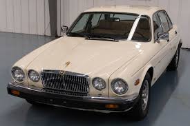 Image result for Nimbus White 1987 Jaguar