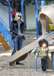 Image result for Easywalker QTRO with Carrycot Seal and Heidi Klum