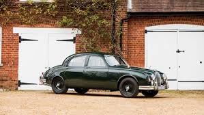 Image result for Dark Green 1959 Jaguar