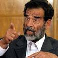 Saddam Hussein durante su