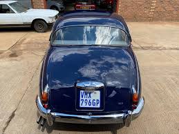 Image result for Dark Blue 1965 Jaguar
