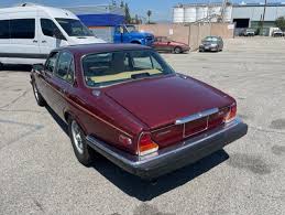Image result for Burgundy 1983 Jaguar