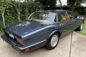 Image result for Black Cherry 1991 Jaguar