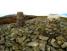 On top is the triangulation pillar at 1894ft (573m) and a range finder. - via Daymix