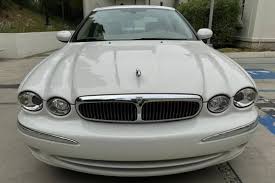 Image result for White Onyx 2002 Jaguar