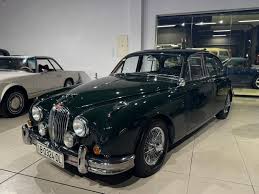 Image result for Carriage Brown 1977 Jaguar