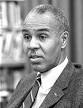 Roy Wilkins as the Executive