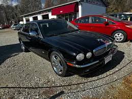 Image result for Black Cherry 2006 Jaguar