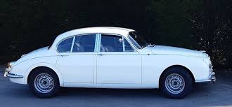 Image result for Old English White 1955 Jaguar