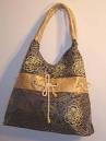 http://image.made-in-china.com/2f0j00AeCtcFqakrkm/Chinese-Silk-Bags-TBH006-.jpg