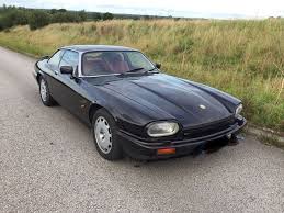 Image result for Black Cherry 1991 Jaguar