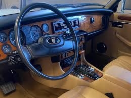 Image result for Nimbus White 1987 Jaguar