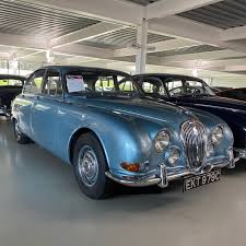 Image result for Dark Blue 1965 Jaguar
