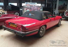 Image result for Sebring Red 1986 Jaguar