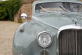 Image result for Silver Gray 1959 Jaguar