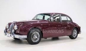 Image result for Maroon 1962 Jaguar