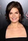 Sela Ward's hairstyle is a bit