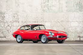 Image result for Maroon 1962 Jaguar