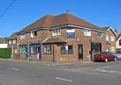On the left is the Two Bob Shop (Two shillings in pre-decimal currency; - via Daymix