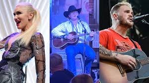 Image result for Queen B by Bumbleride $428 Gwen Stefani and Gavin Rossdale with Kingston and Zuma at the LA zoo