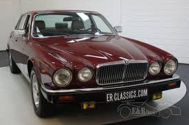 Image result for Sebring Red 1986 Jaguar