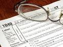 How Should Taxable Income Be Adjusted for Capital Loss? | eHow.