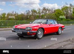 Image result for Sebring Red 1986 Jaguar