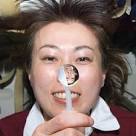 Japan Aerospace Exploration Agency (JAXA) astronaut Naoko Yamazaki squeezes ... - space-bubble_1615754i