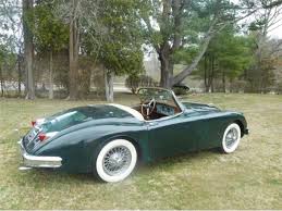 Image result for Dark Green 1959 Jaguar